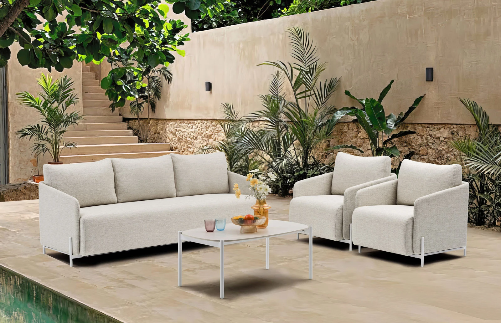 Área de piscina com mobiliário de exterior